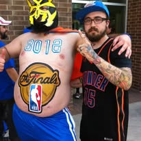 Garrett Haviland and the artist behind the belly paint